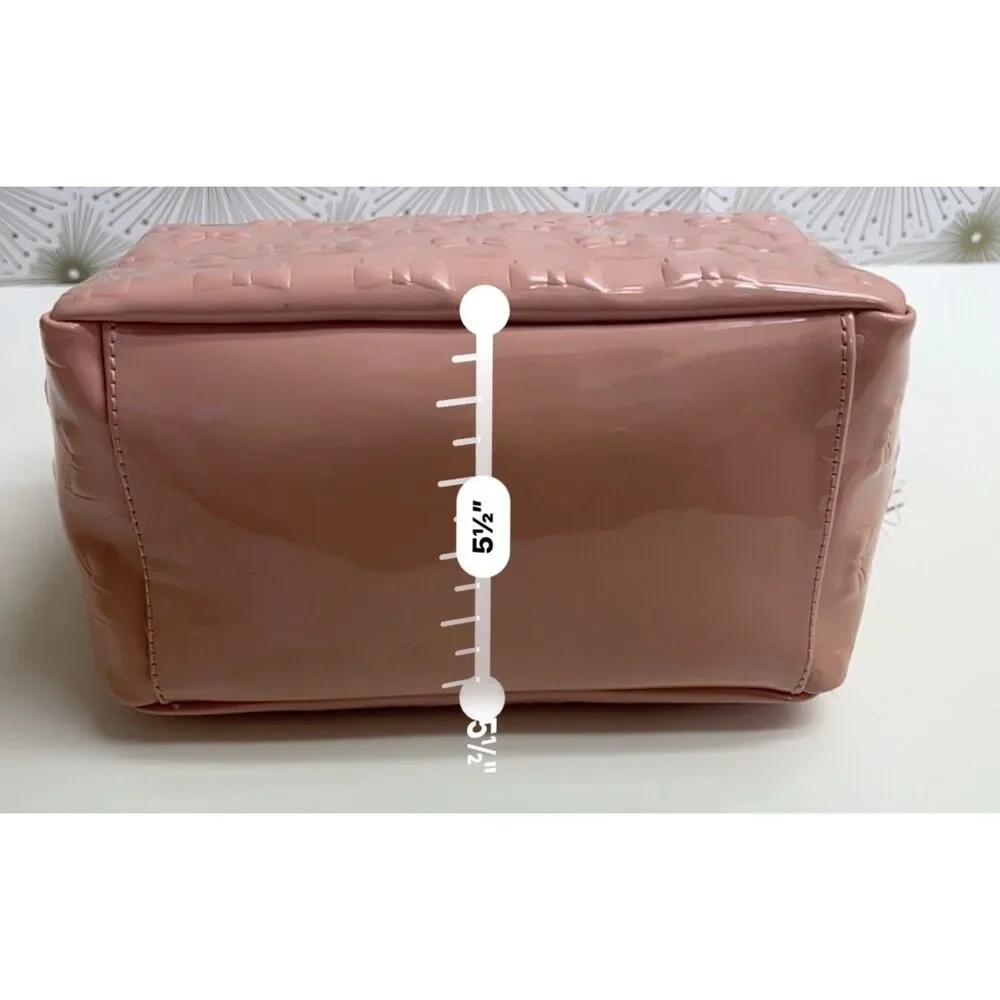 Betsey Johnson embossed patent travel/cosmetic bag in blush pink. NWT.
